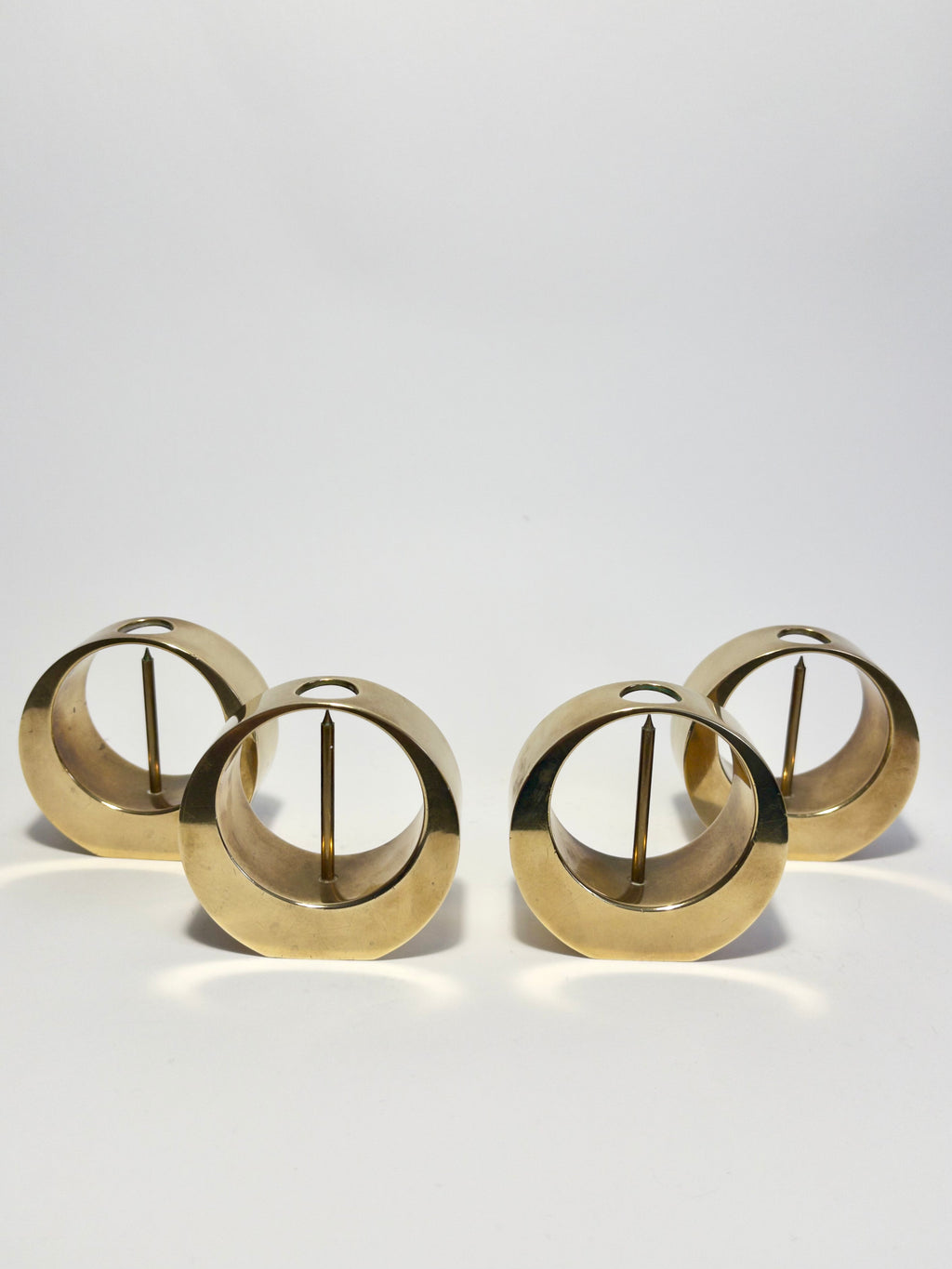 Set of four Mid-Century Modern brass candle holders by Arthur Pe, Kolbäck, Sweden c.1960s