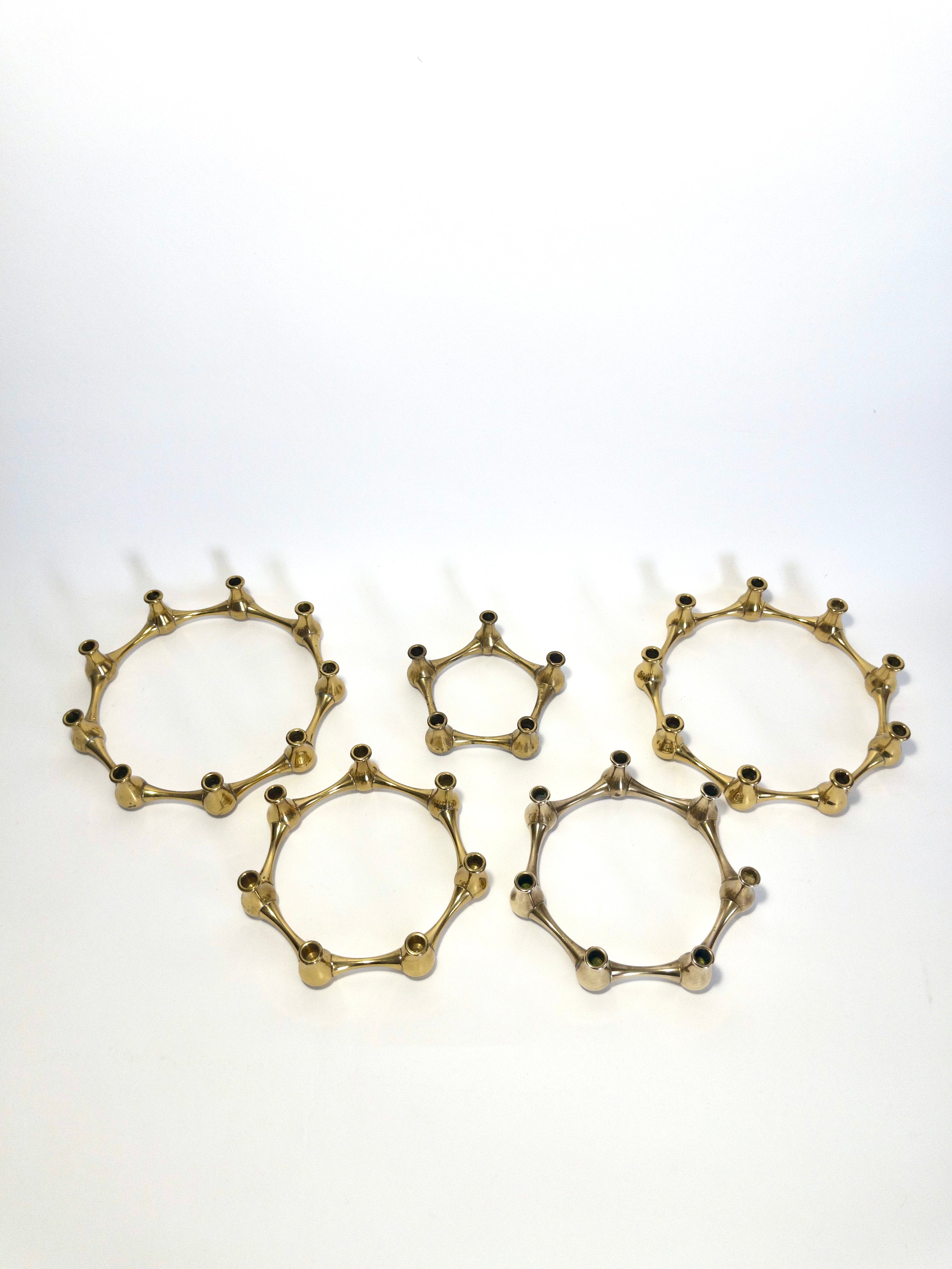 Set of five brass taper candle holders designed by Jens Quistgaard for Dansk Designs, Denmark, c.1960s